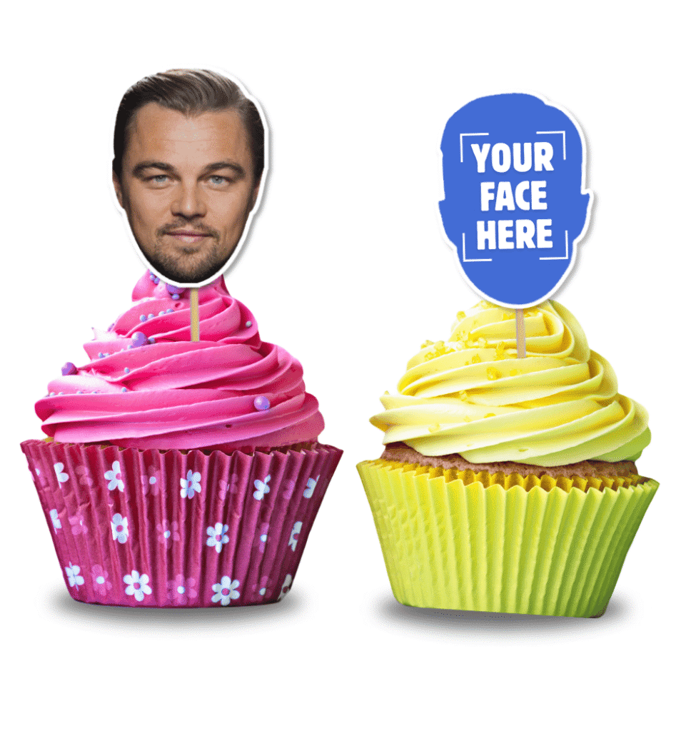 Cupcakes with personalised toppers featuring faces, one pink cupcake and one yellow cupcake