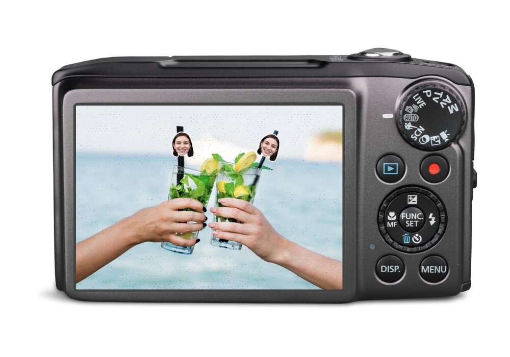 Digital camera displaying a photo of drinks with personalised face straws