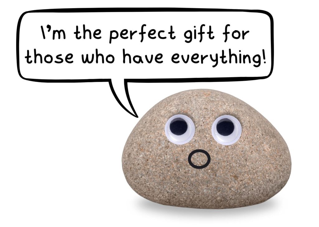 Pet rock with googly eyes and a speech bubble saying ‘I’m the perfect gift for those who have everything!