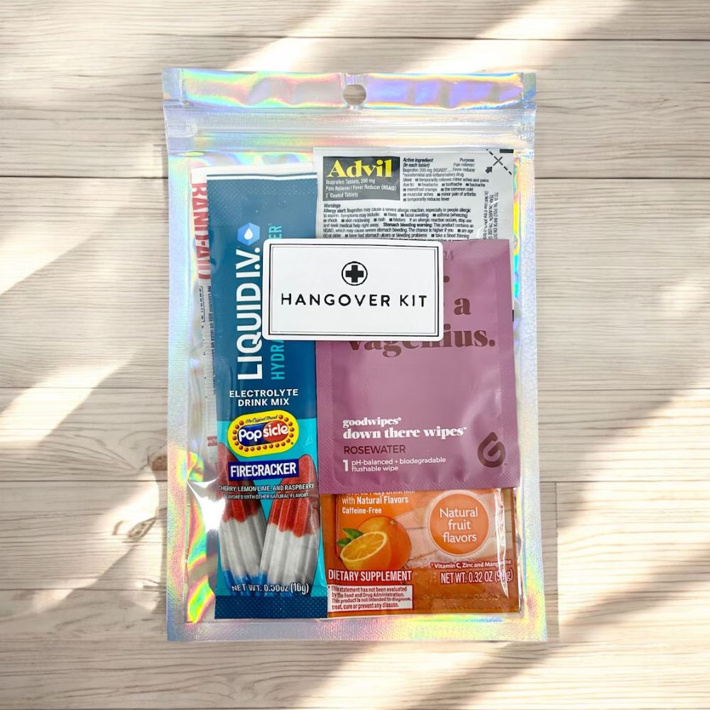A thoughtful hangover kit including electrolyte powder, aspirin, and mints, perfect for post-party recovery.