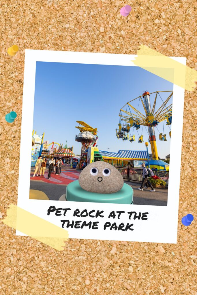 Pet rock sitting at a theme park, captioned ‘Pet Rock at the Theme Park’